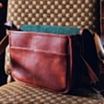 Handmade leather Shoulder Post bag in Italian soft hide matt sienna colour.